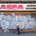 201603_31_DSC07061-graffiti-covered-shop-facade-with-person-by-E-Girardet.jpg