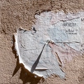 202204_18_IMG_0964-torn-poster-on-textured-wall-architects-info-by-E-Girardet.jpg