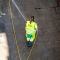 202207_07_RXX01687-person-cleaning-city-street-with-water-jet-by-E-Girardet.jpg