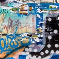 202207_23_IMG_2759-graffiti-covered-wall-with-ripped-posters-by-E-Girardet.jpg