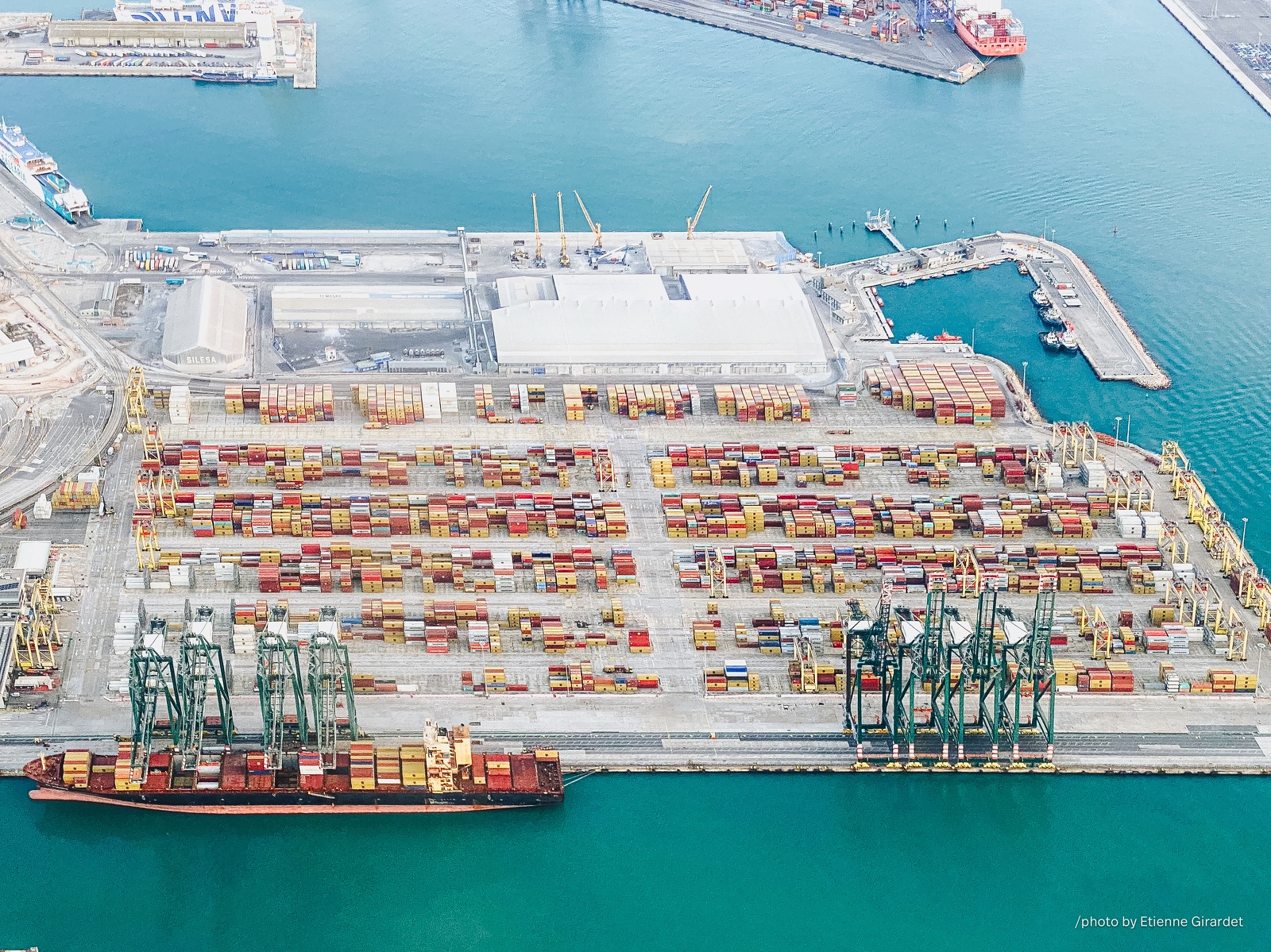 202301_29_IMG_4965-aerial-view-of-busy-port-with-containers-by-E-Girardet.jpg