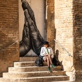 202302_02_RXX02604-woman-reading-book-on-steps-by-mural-by-E-Girardet.jpg