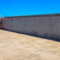 202302_03_IMG_5315-worker-sweeping-concrete-rooftop-area-by-E-Girardet.jpg