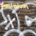202301_26_IMG_4853-graffiti-on-dark-brick-wall-says-femission-by-E-Girardet.jpg