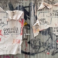 202303_24_IMG_5664-torn-posters-on-weathered-wall-by-E-Girardet.jpg