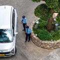 202311_29_ZZ63466-white-car-guarded-by-security-guards-by-E-Girardet.jpg