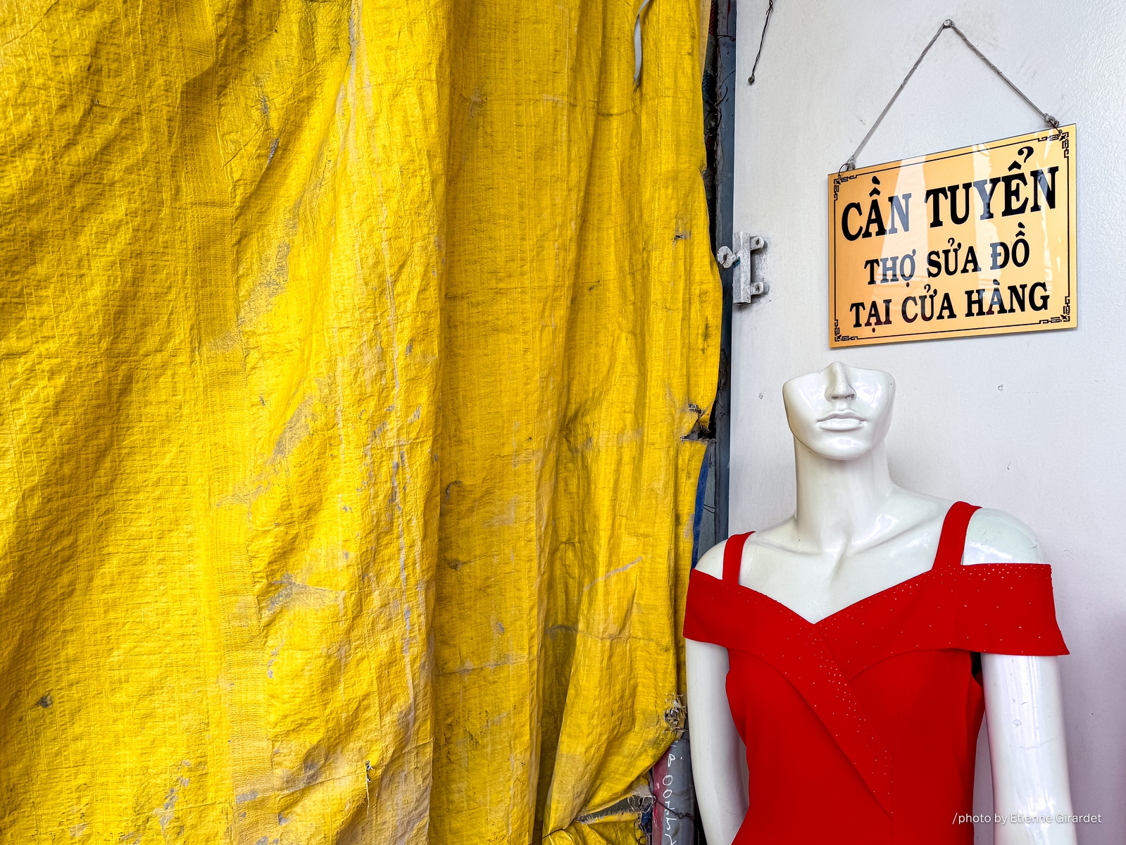 202312_03_IMG_9144-yellow-tarp-shop-sign-red-dress-mannequin-by-E-Girardet.jpg