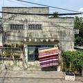 202312_10_IMG_9562-weathered-building-plants-clothesline-by-E-Girardet.jpg
