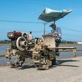 202401_08_RXX07436-farmer-operates-muddy-rice-paddy-tractor-by-E-Girardet.jpg