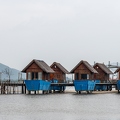 202401_11_ZZ64998-wooden-huts-on-stilts-over-water-by-E-Girardet.jpg