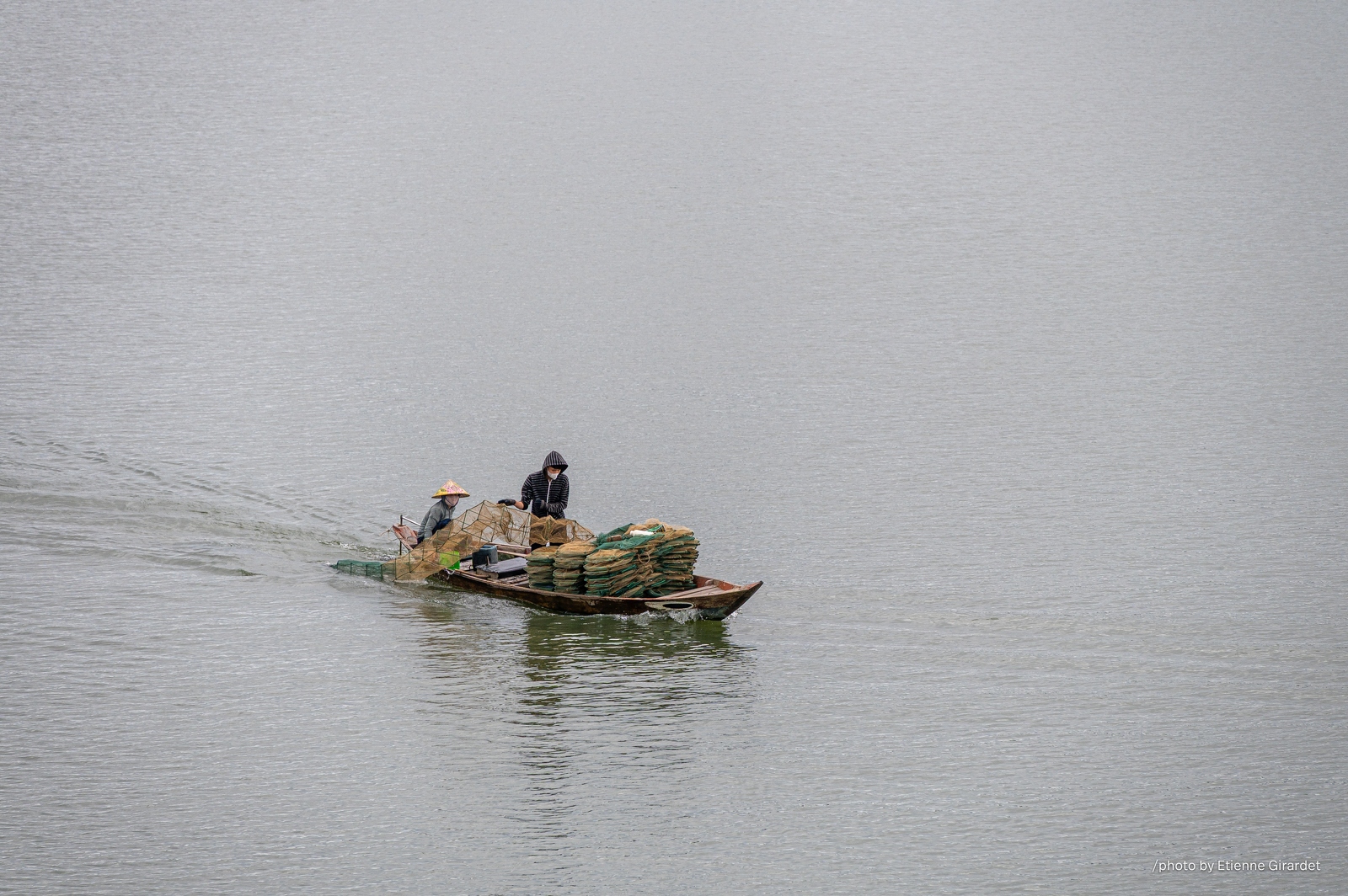 202401_22_ZZ65187-fishermen-on-boat-with-nets-by-E-Girardet.jpg