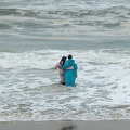 202401_23_RXX07517-couple-wading-in-rough-surf-by-E-Girardet.jpg