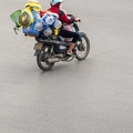 202402_04_RXX07769-overloaded-motorbike-rider-on-street-by-E-Girardet.jpg