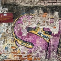 202402_07_IMG_3805-graffiti-covered-brick-wall-with-signs-by-E-Girardet.jpg