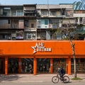 202402_11_RXX08030-orange-shopfront-hi-vietnam-buildings-by-E-Girardet.jpg